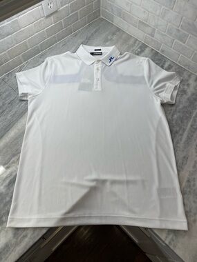 J.Lindeberg White Polo with Blue Logo